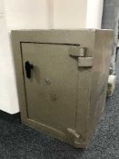 A metal fire safe with key