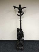 A carved Black Forest hall stand decorated with three bears,