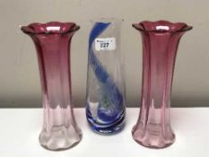 A pair of Victorian ruby glass vases,