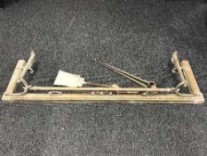 A brass fire curb and a part companion set