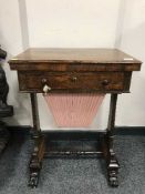 A Victorian rosewood work table with chessboard interior