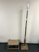 A walnut and chrome art deco style standard lamp together with an oak rush seated stool