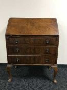 A walnut Queen Ann style writing bureau