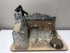 A tray of crystal decanter, six glasses, plated cake servers, soda syphon, pewter tankard,