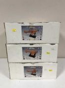 Twelve boxed wooden military aircraft and helicopters on stands