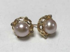 Good quality pair of 18ct pearl and diamond earrings