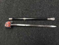 A decorative basket handled sword in scabbard