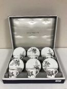 A boxed Royal Worcester twelve piece coffee set