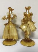 A pair of mid 20th century Murano glass figures depicting ladies in dresses