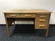 A mid twentieth century oak writing desk
