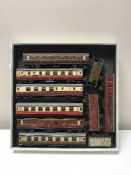 A box of vintage tin plated Hornby 00 carriages