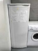 A Pro-line upright freezer