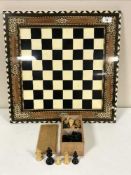 A Staunton Style chess set with inlaid chess board