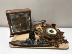 A tray of walnut clock, German barometer, wooden nut bowl with nut cracker,