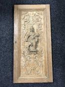 An oak and pine four drawer chest together with a carved panel door