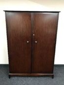 Two mahogany Stag Minstrel double wardrobes