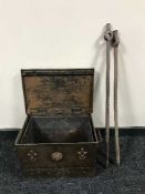 An early twentieth century copper coal receiver with liner together with a pair of cast metal