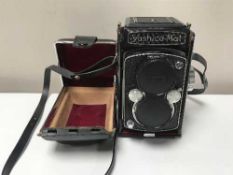 A Yashika-Mat film camera.
