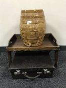 A mid twentieth century nurses suit case together with an oak bed table made by St.