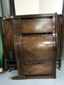 A Victorian inlaid mahogany 4'6 bed frame