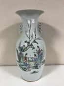 A 19th century Chinese vase, character marks to base, depicting figures in a garden,
