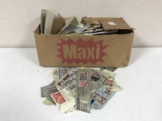 A box of loose stamps