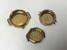 Three gold Rolex watch cases