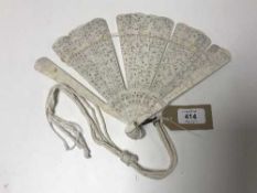 An antique Chinese carved ivory hand fan