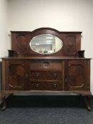 A mahogany Queen Anne style mirror backed sideboard