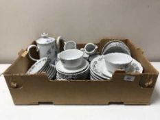 A box of German white and floral tea and dinner service