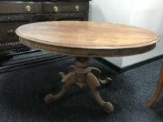 A Victorian oval breakfast table