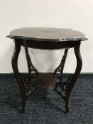 A late Victorian shaped mahogany occasional table
