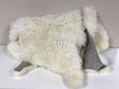 Two sheepskin rugs