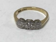 18ct three stone diamond ring approximately .35ct, 2.