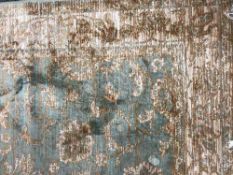 A fringed Zeigler Persian carpet 190 cm x 140 cm on green ground