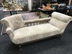 A nineteenth century buttoned chaise longue