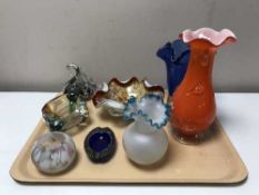A tray of six pieces of decorative coloured glass