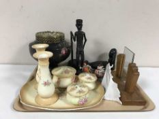 A Monmouth china rose bowl, hard wood figures, six piece dressing table set,