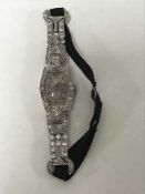 Superb quality Lady's platinum cocktail watch set with approximately 2.