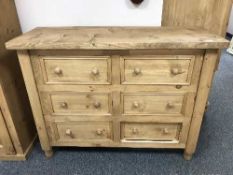 A pine six drawer block chest