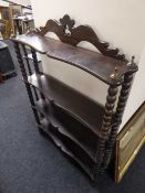 A rosewood four tier what not stand