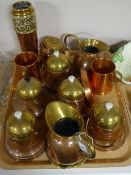 A tray of copper and brass ware - lidded pot, jugs, vase,