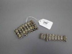 Two heavy silver bracelets, 5.