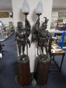 A pair of impressive spelter figure lamps of soldiers on octagonal pine plinths,