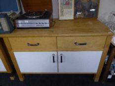 A pine Ikea work bench fitted two drawers and cupboards