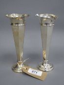 A pair of silver flower vases, height 15.5 cm, loaded.