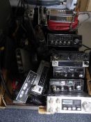 A box of assorted ham radio transceivers and Linear amps by Binatone, Hawk,