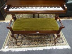 An Edwardian mahogany storage duet stool