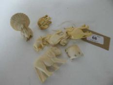 A collection of seven carved bone animals