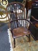 A 19th century elm Windsor chair